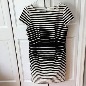 Cap sleeved black and white mid length dress